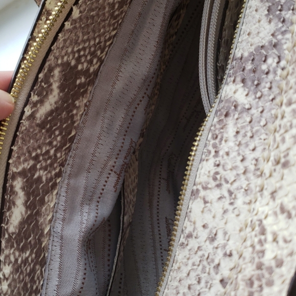 Leather bag has snake leather texture - Picture 8 of 11